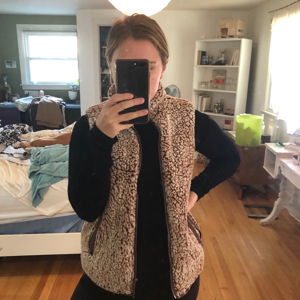 brown and white fluffy vest
